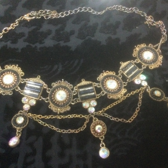 Antique gold tone finish w/ black enamel and aurora borealis crystals. - Picture 2 of 2